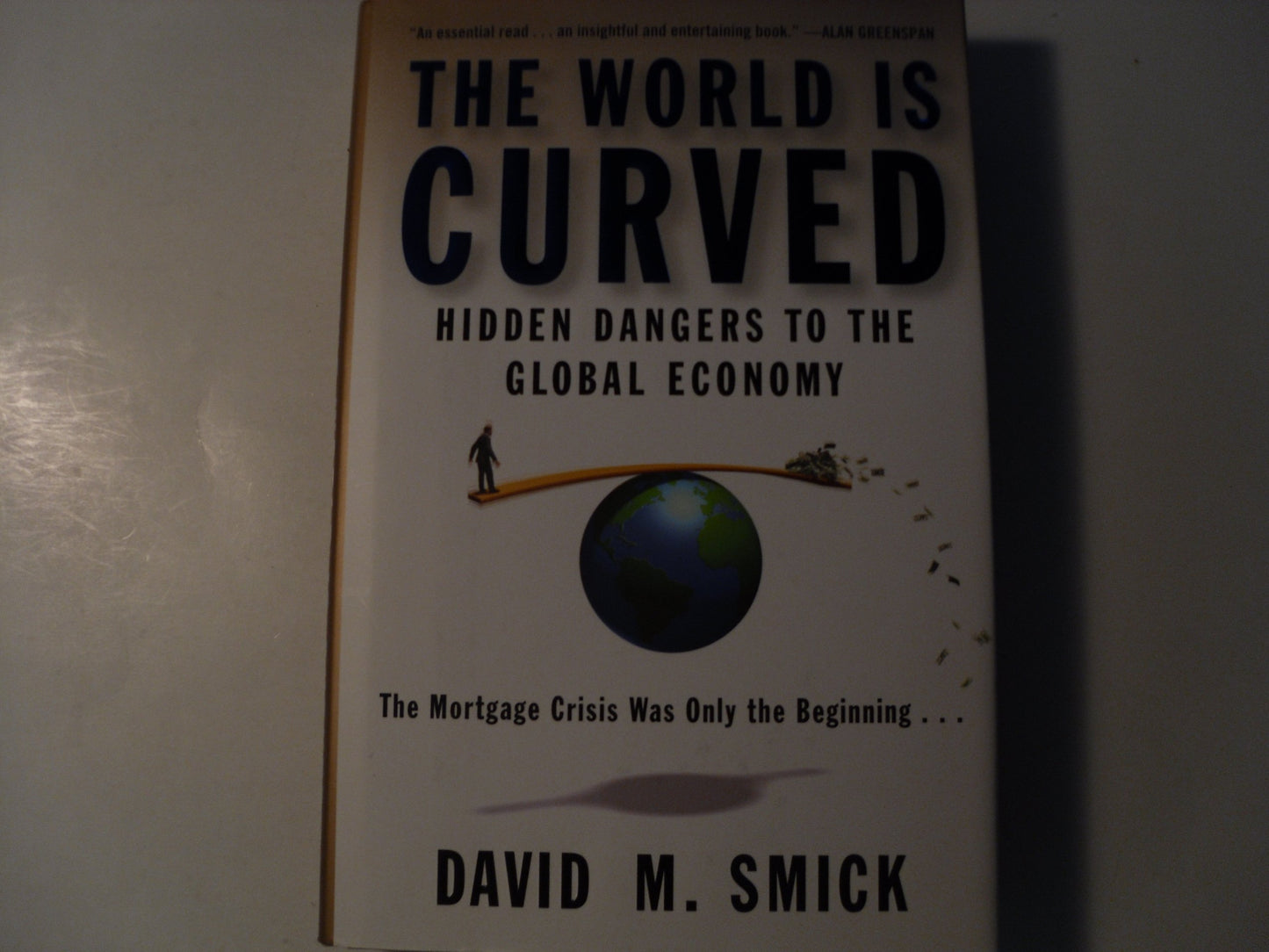 The World Is Curved: Hidden Dangers to the Global Economy